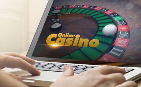 A person playing at an online casino from the computer.