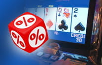 A video poker machine and a die on the sides of which the percentage symbol appears instead of numbers.