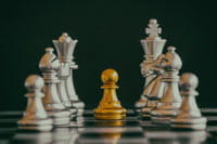 The chessboard with the pieces represents the quintessential strategy game.