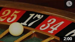 Live roulette game with a croupier managing the table.
