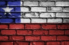 Chile flag painted on brick wall